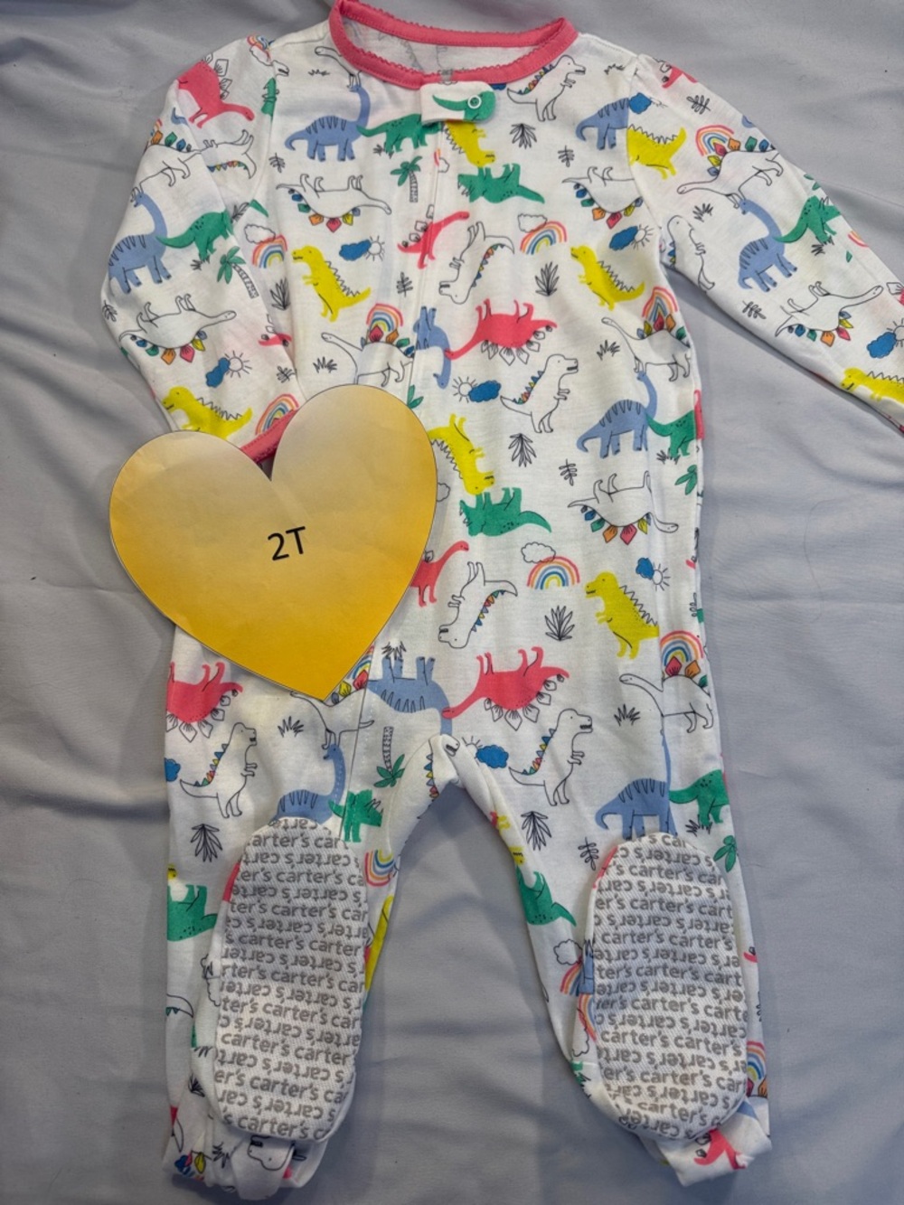 Carter's - footed sleeper with dinosaur design. Size 2T